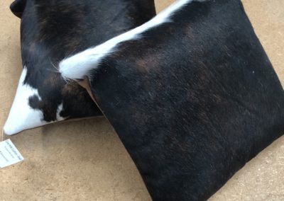 Tri-colour cowhide cushion