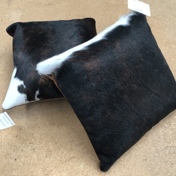 Tri-colour cowhide cushion